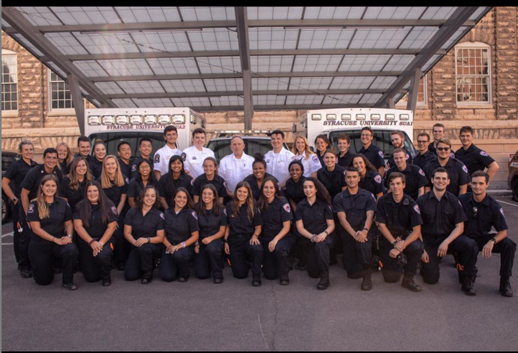 Sarah Koutana '20 (middle, 5th from right) with the Syracuse University Ambulance Squad (SUA). Photo courtesy of SUA.