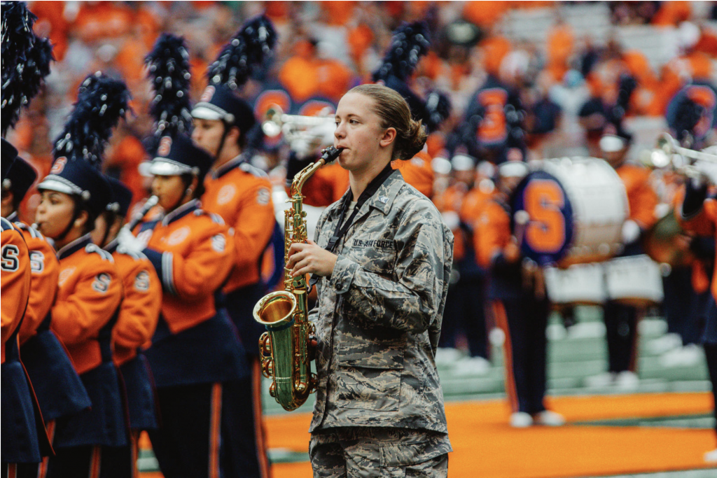 Erin '22 plays the alto sax in the Syracuse University Marching Band. 